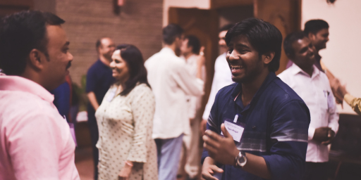 A group of people smiling together